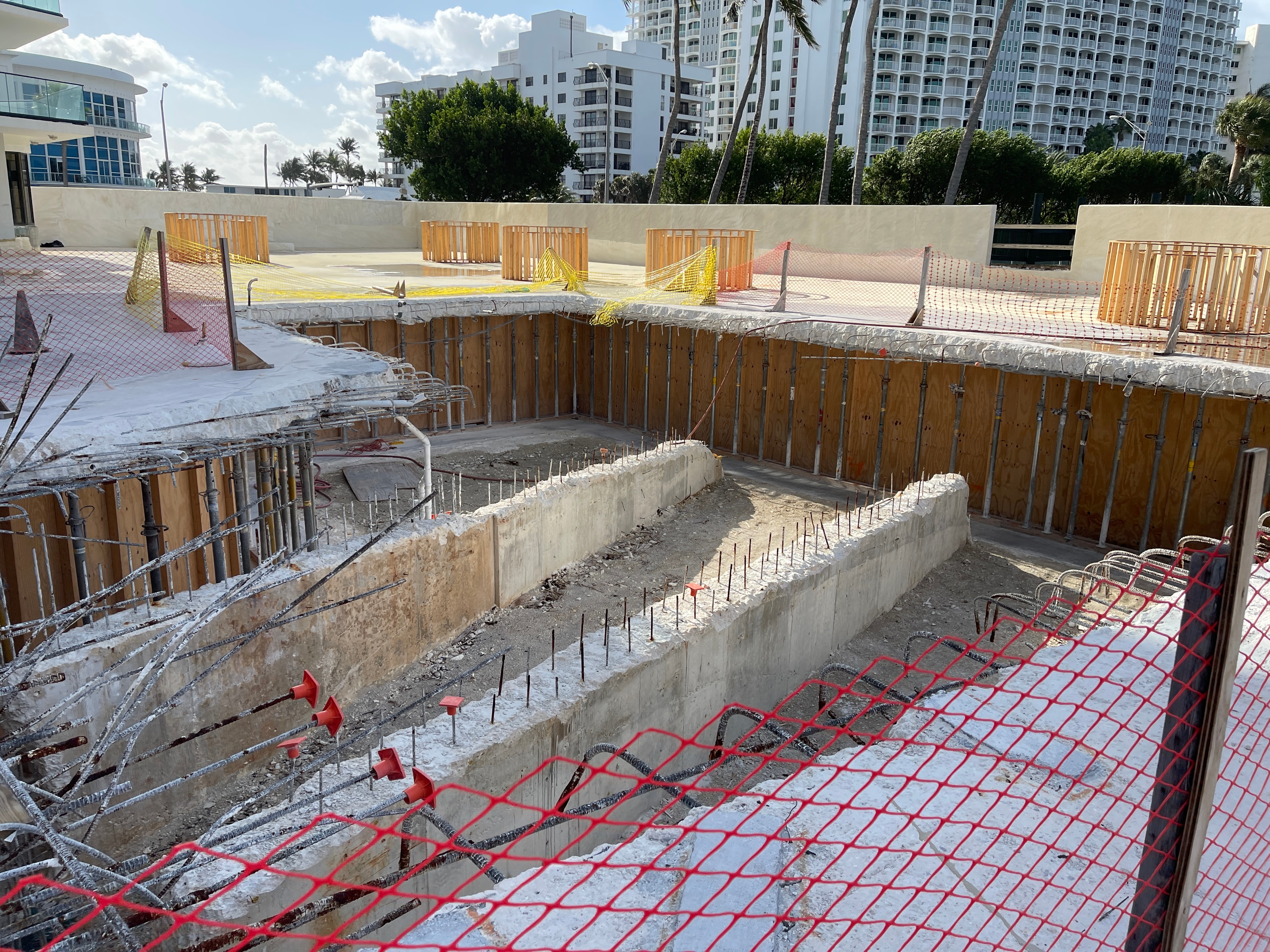 Pool completely demolished down to rebar and concrete footings before structural rebuild